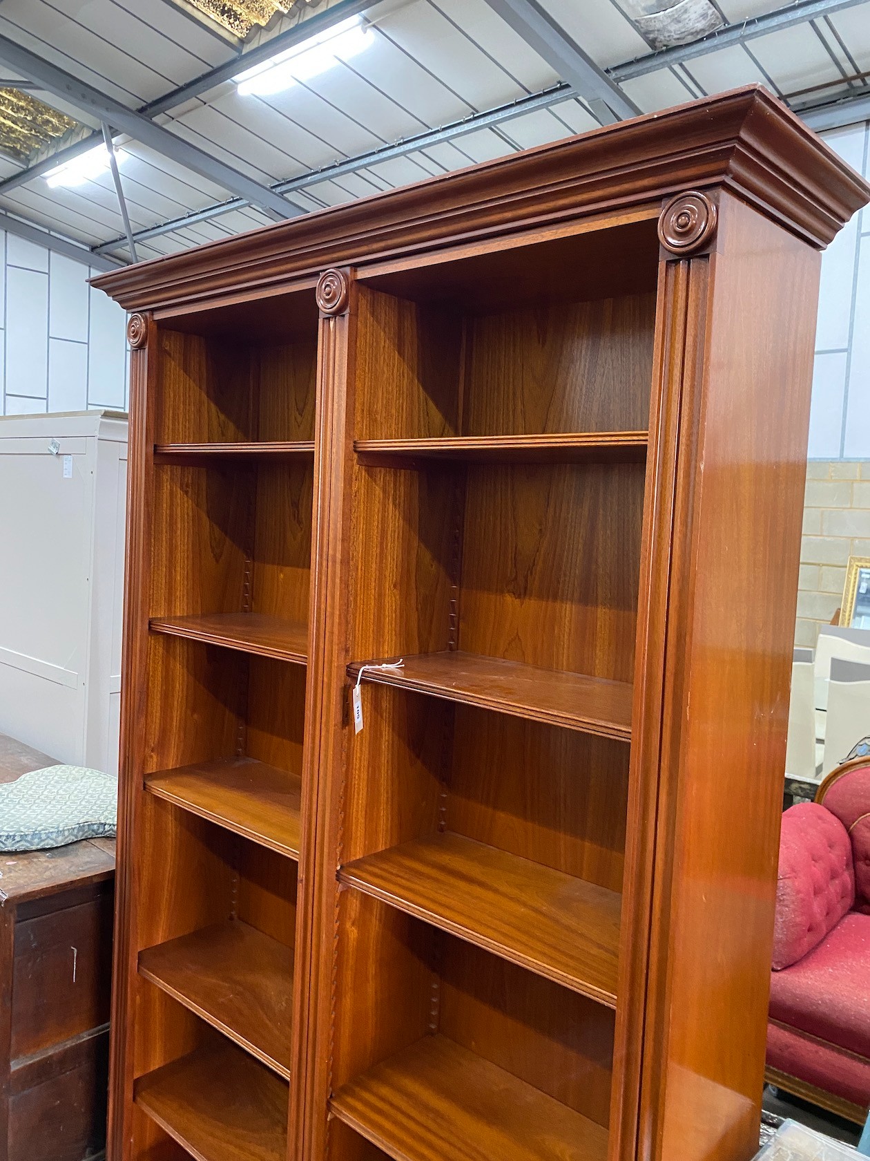 A Victorian style mahogany open bookcase, width 138cm, depth 37cm, height 213cm